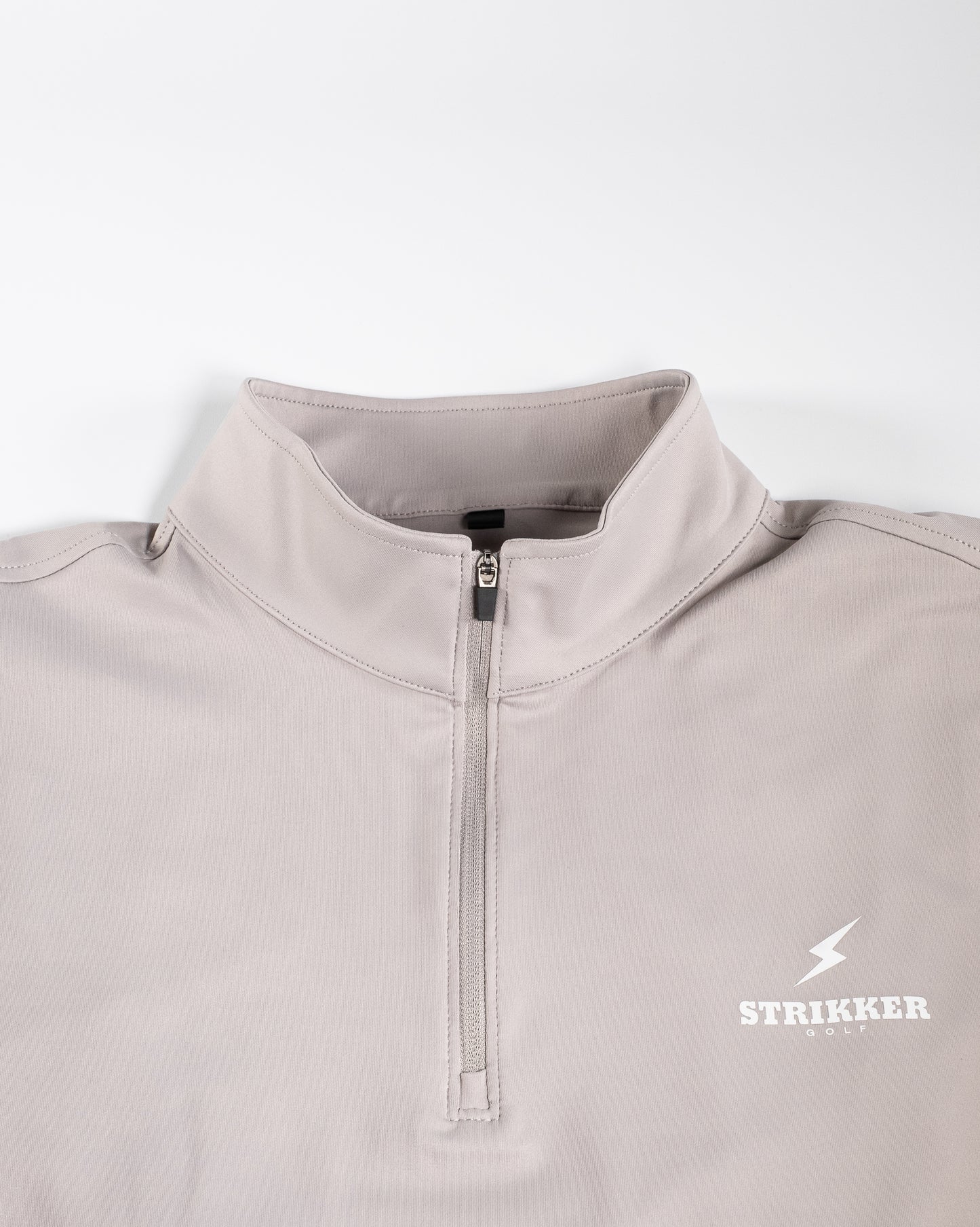Strikker Golf 1/4 zip Sweatshirt